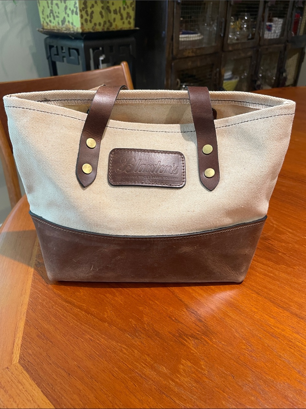 Blanton’s canvas and leather small tote bag